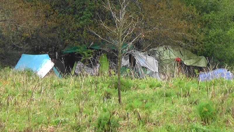 Group of tent structures adjacent to the Barrio