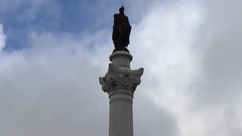 Spot the bird on the top of the statue