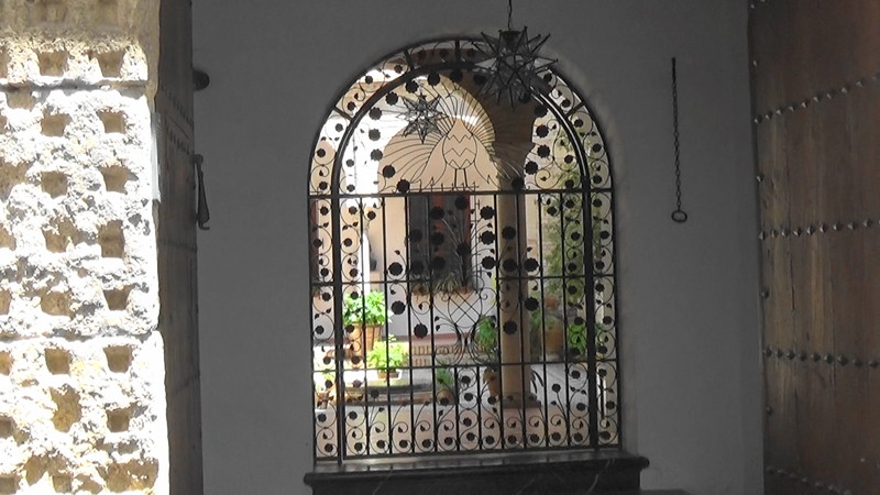 Through a gate to a private courtyard