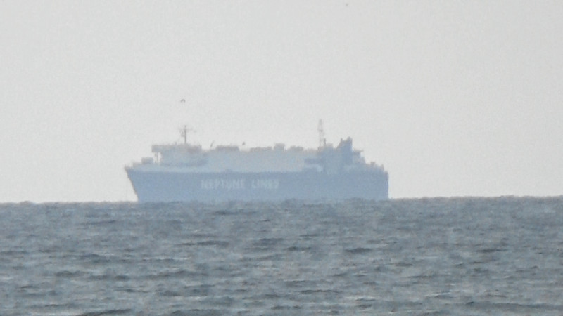 Car carrier at anchor off Sagunto port