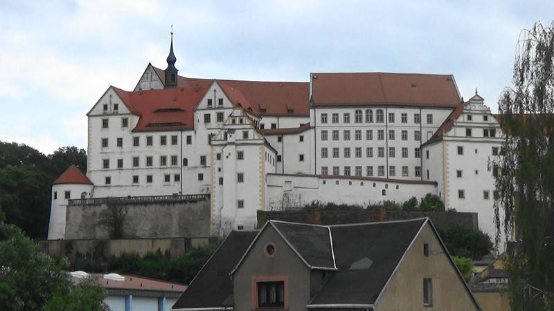Colditz Castle from the river that runs through the town