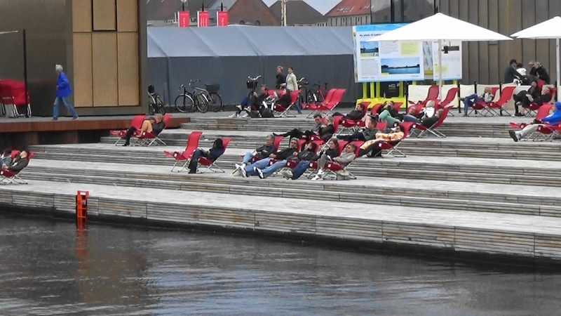 Why were these people on deck chairs looking at the canal,Copenhagen