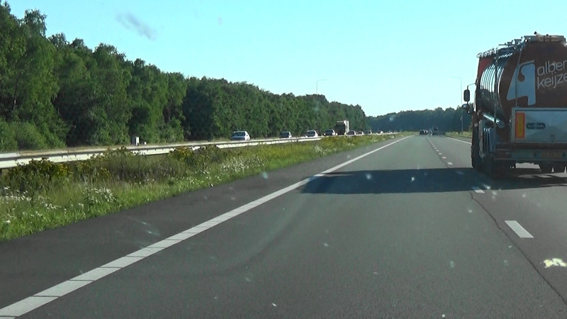 The road is flat and straight,this must be Holland