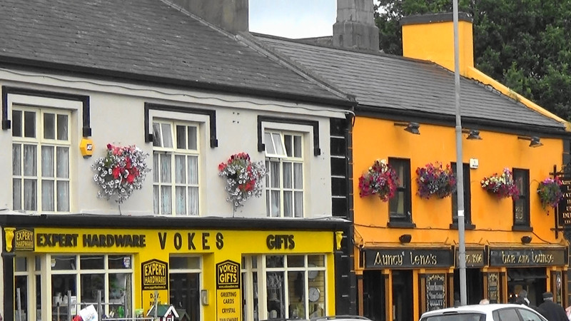 Shops with their hanging baskets,Adare
