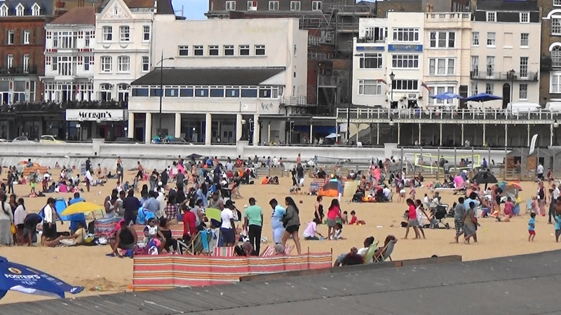 The crowds were mostly back on the clean part of the sandy beach,Margate