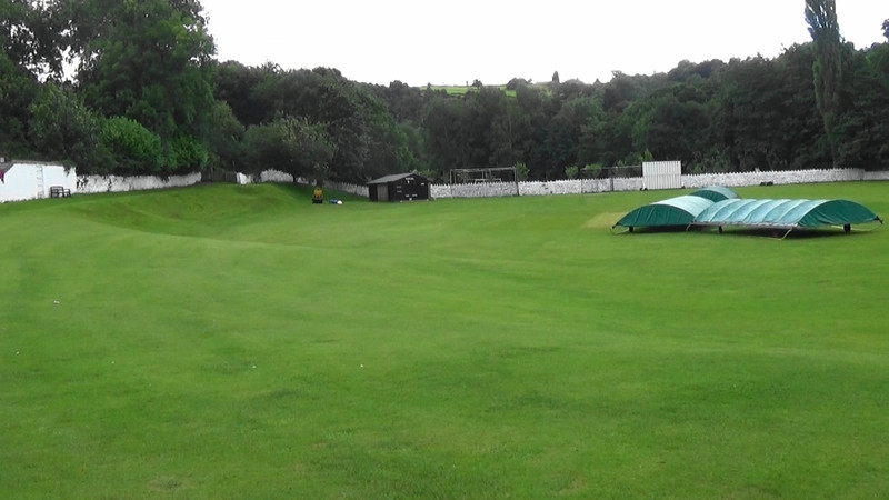 Hayfield Cricket Ground.Note the rise in the outfield boundary