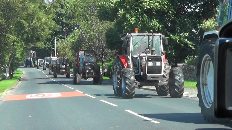 Parade of farm tractors on the A6