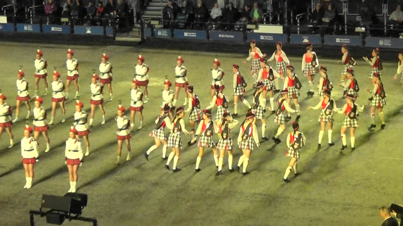The marching team and Highland dancers dance and march together