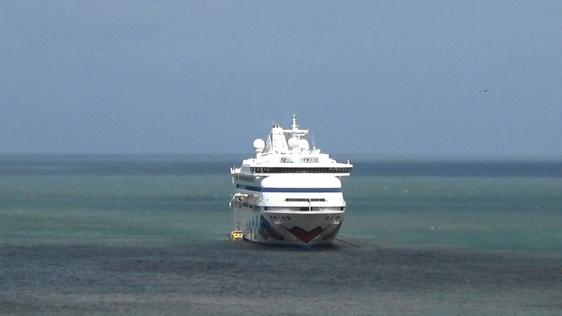 The cruise ship at anchor off Fishguard