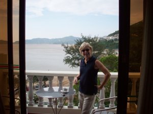 Pam on Balcony at her hotel