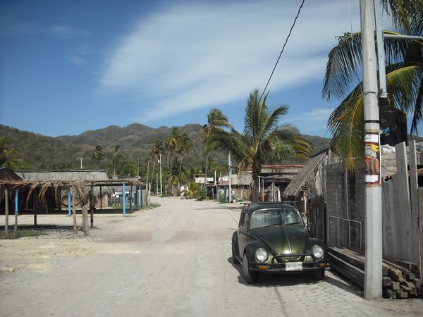 The main street in Maruata village