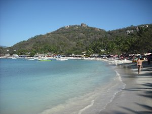 Playa de las Gatas with its million beach chairs
