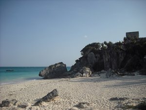 Another tiny beach on the site with the ruins towering over it