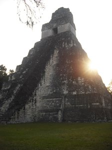 Dawn sun behind Temple I, Tikal