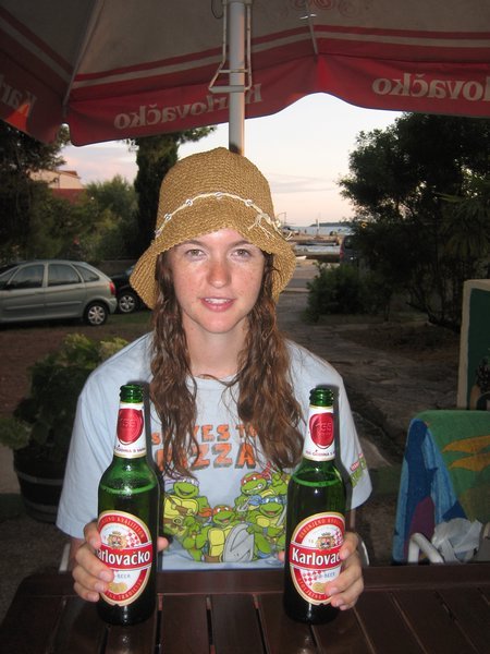 Enjoying Croatia beer after a swim