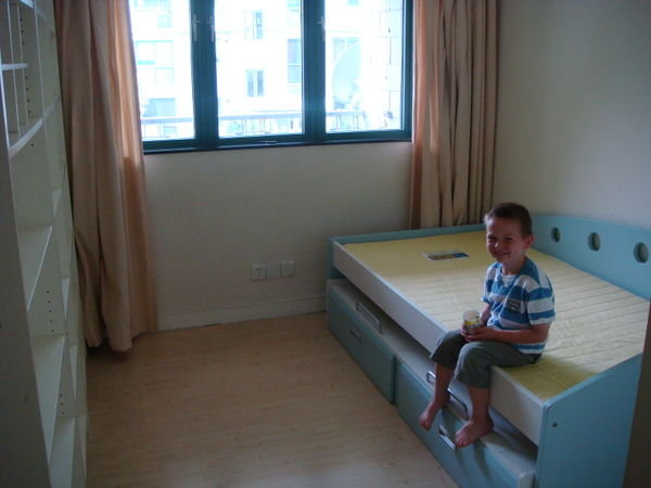 William in his empty bedroom