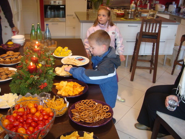 The kids digging in and they haven't even taken their coats off!