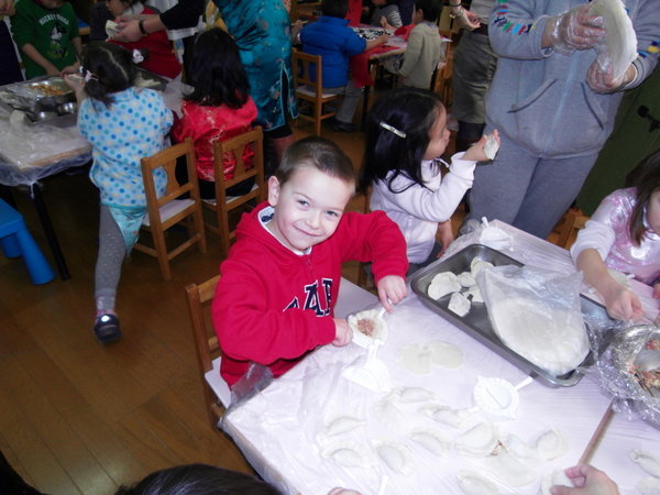 William making dumplings