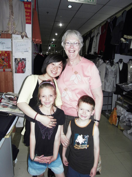 Nanny and the kids with another friendly vendor