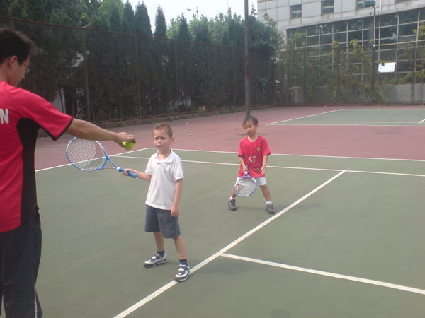 The boys in action at tennis!