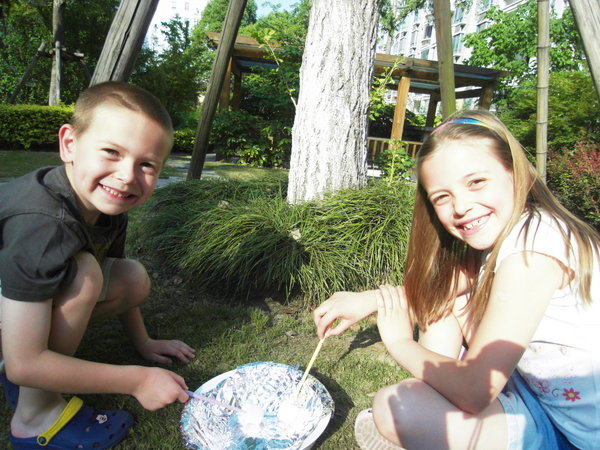 Cooking marshmallows outdoors..Girl Scouts style!
