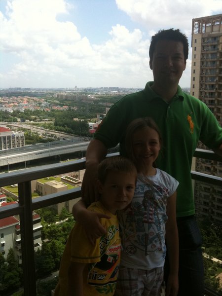 Daddy and the kids braving the balcony!