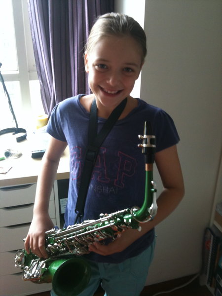 Sophie winning the coloured saxophone