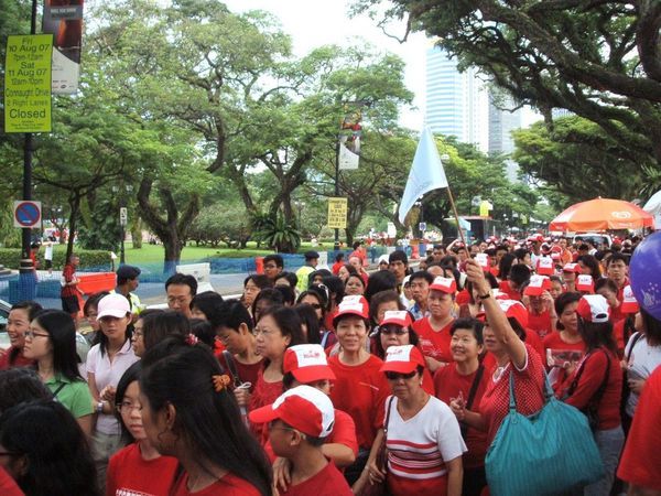 Excited revellers in a sea of red