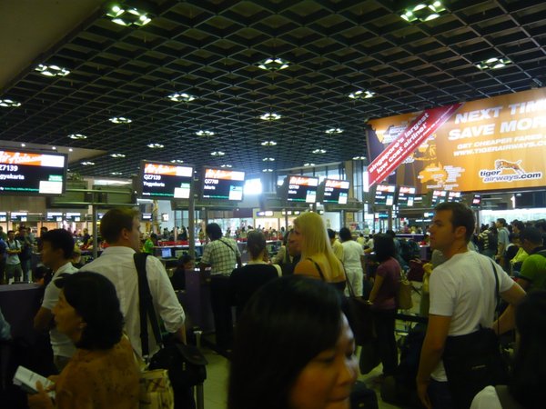 The huge Tiger Airways banner over looking Air Asia's Check-in counters