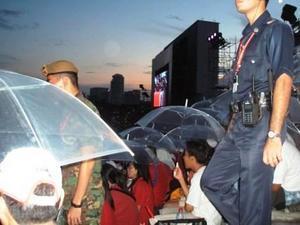 Umbrellas as a shield for the fireworks