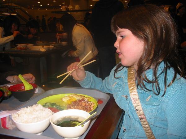 Emilia's getting good with the chopsticks