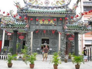 Lee in front of one of many ornate Chinese temples