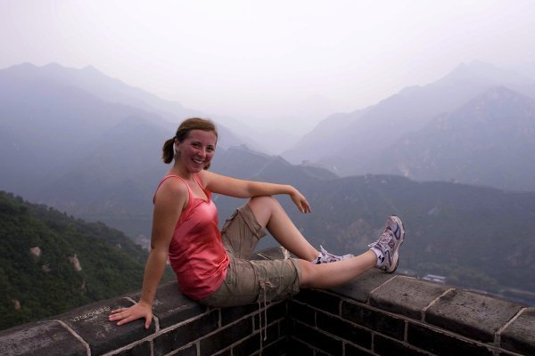Me faking a smile at the Great Wall