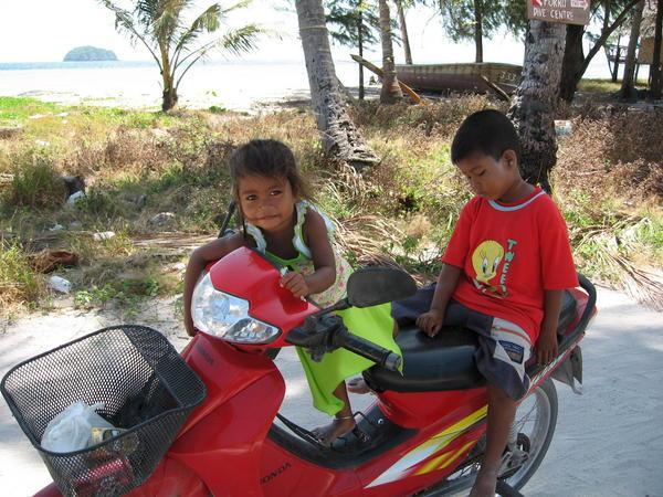 Chao Lay kids on moped