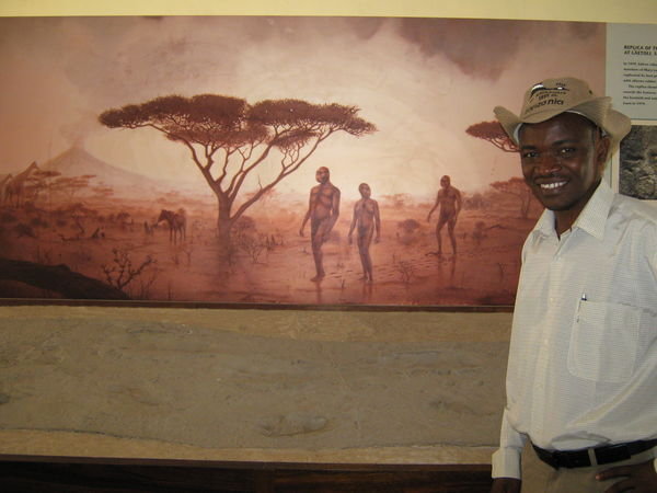 Fredrick in front of 3.6 million year old footprints (Replicas)