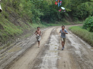 Local kids chasing the truck