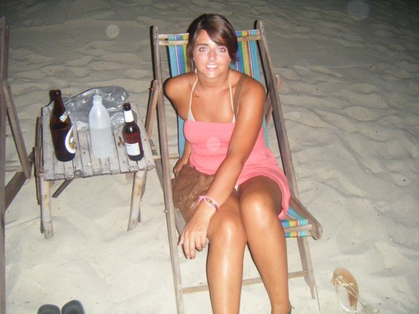 Vicki boozes on the beach