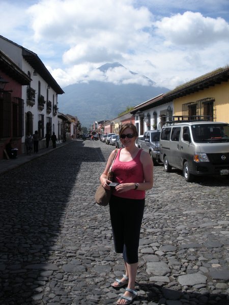 Street in Antigua - Volcan de Agua overlooking the city