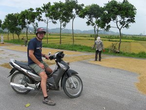 Motor cycle trip along the rice field