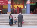 Tibetan family watching the debatting
