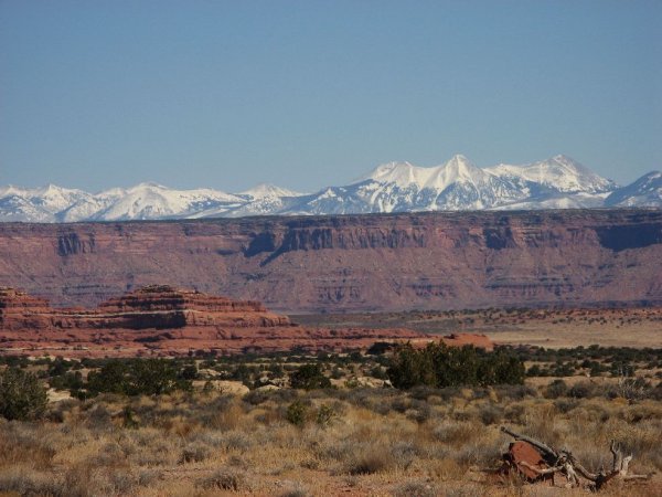 plains, mesas and snow covered mountains