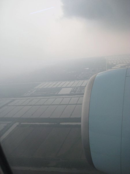 landing in China through the rain and smog