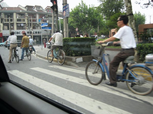there are tons of bicycles and scooters, none which obey traffic signals