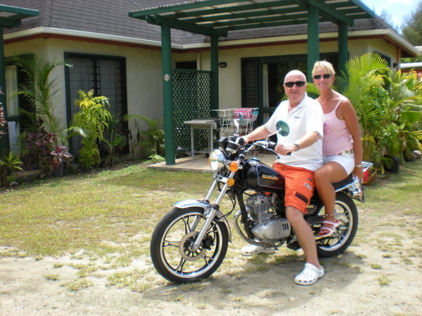 Our motorbike outside our bungalow
