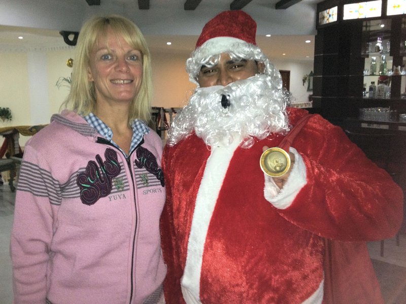 Michelle's annual photo with a foreign Father Christmas