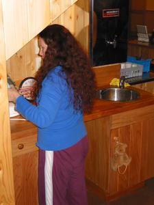 Janie prepares herself a hot drink