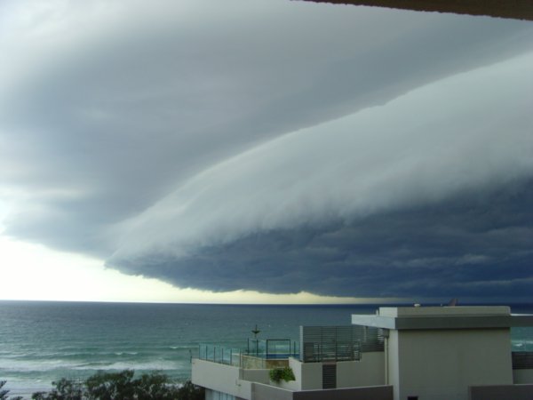 Storm brewing over surfers