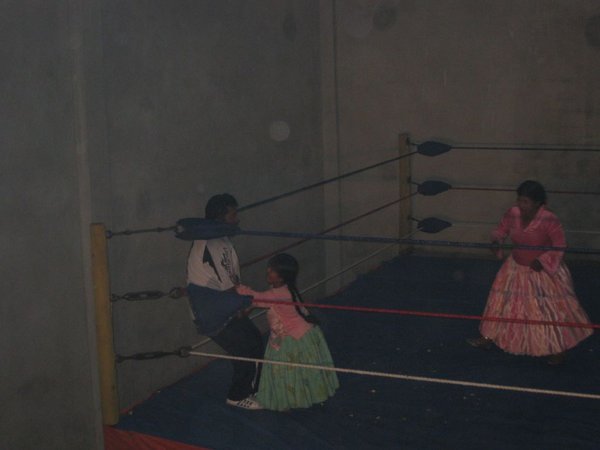 When the female Bolivian midget wasn´t being thrown too the floor she was busy grabbing the referee by the balls