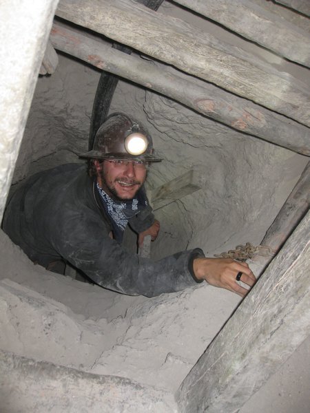 Climbing up one of the narrow mine sharfts 