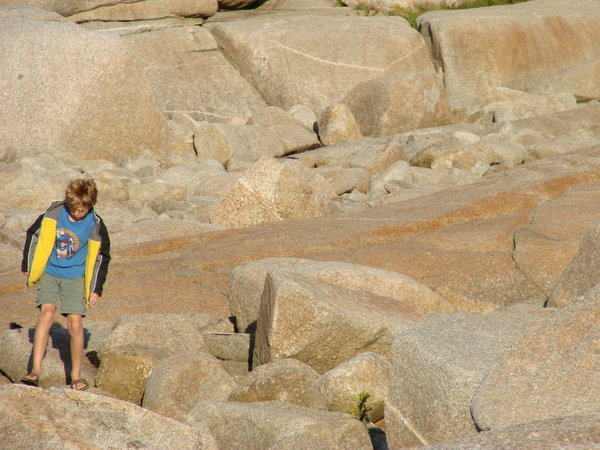 Trevor climbing the rocks